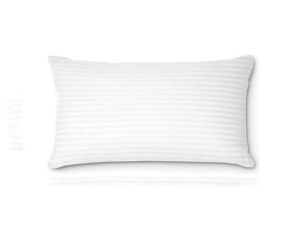 White pillow with subtle striped pattern on a white background